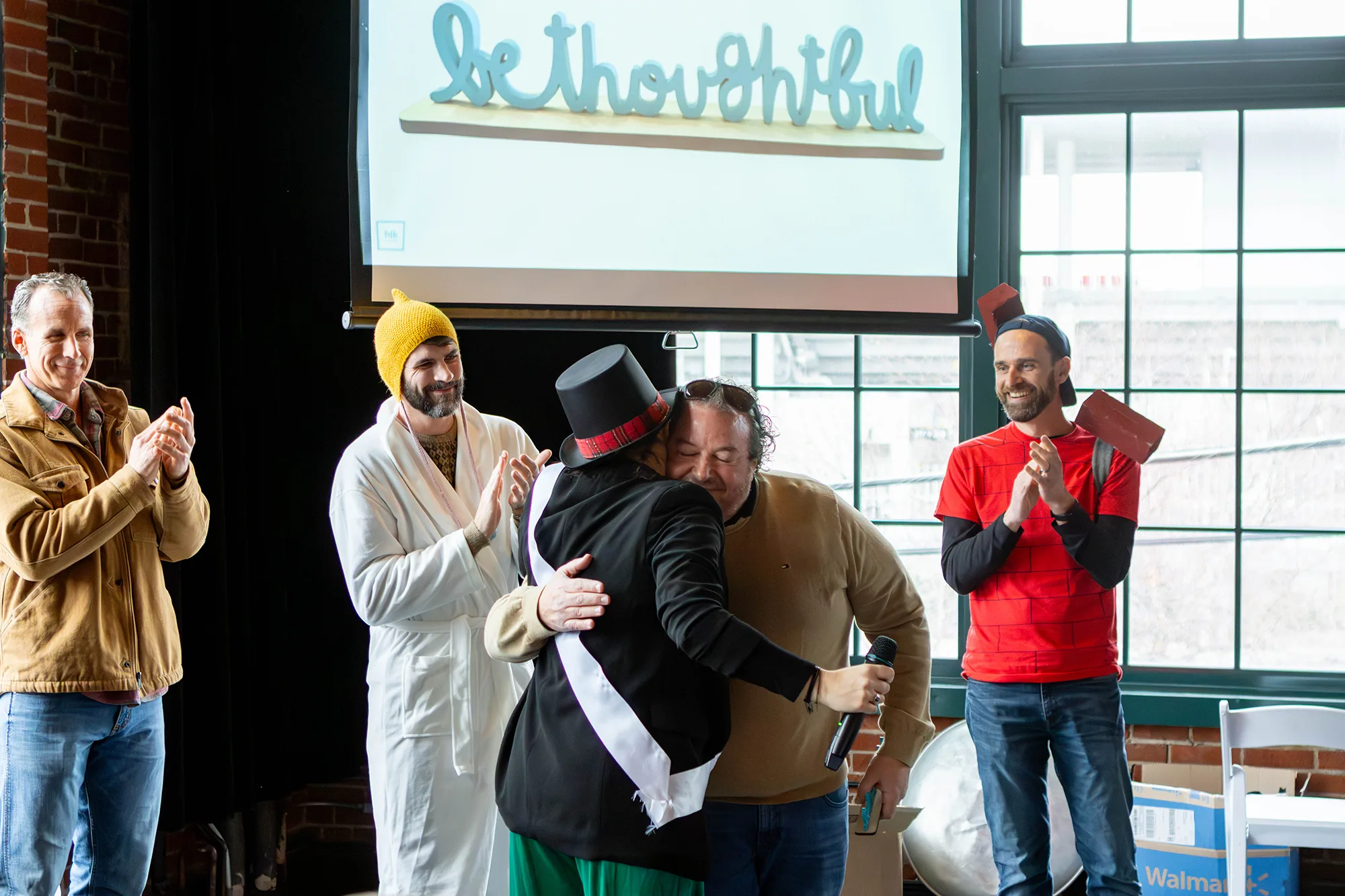 Matt Anselm receiving the "Be Thoughtful" award.