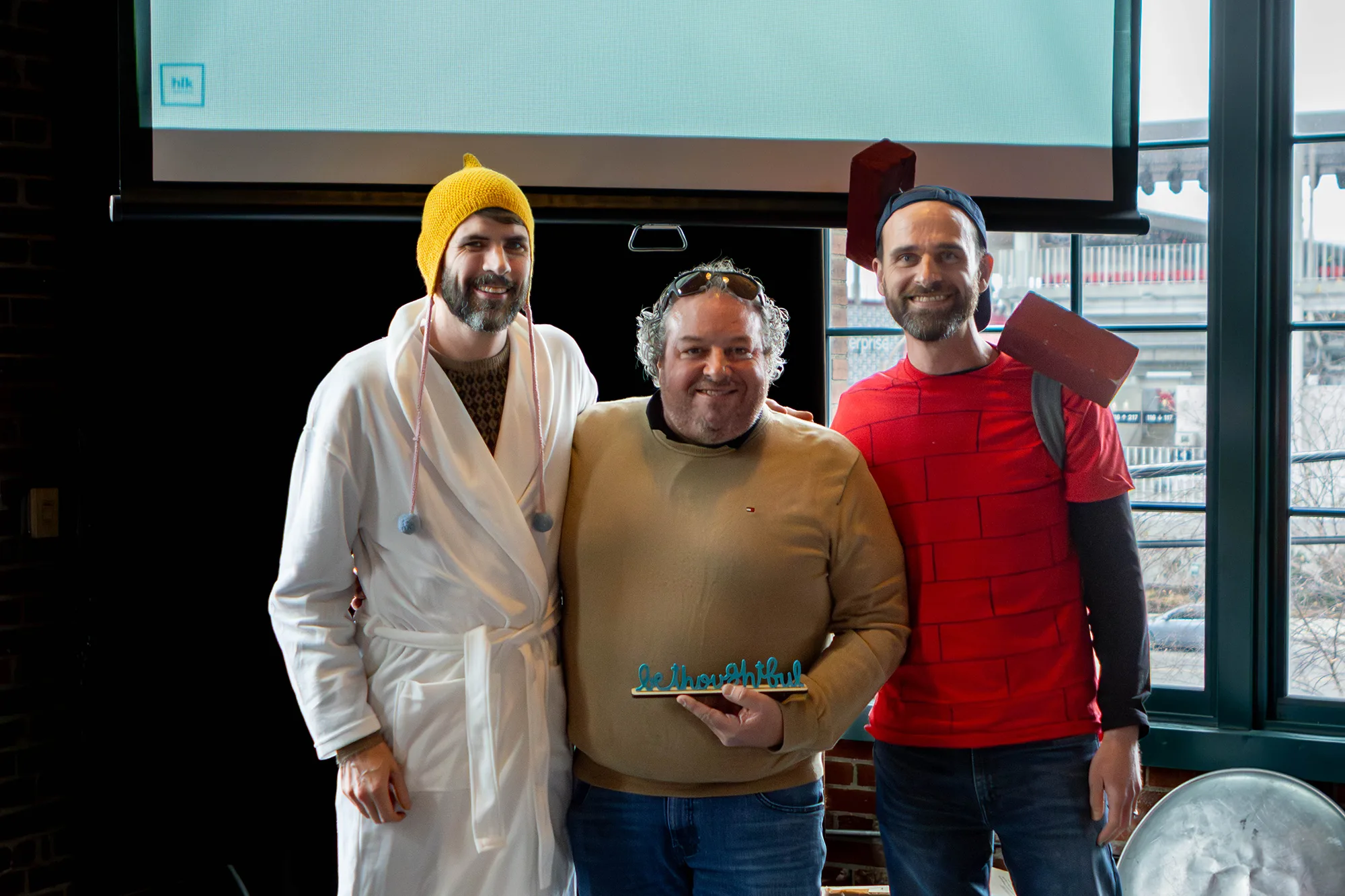 The three finalists for the "Be Thoughtful" award. From left to right: Will Sharpe - ACD-Writer, Matt Anselm - Director Video Production and Aaron Newcom - Media Operations Supervisor.
