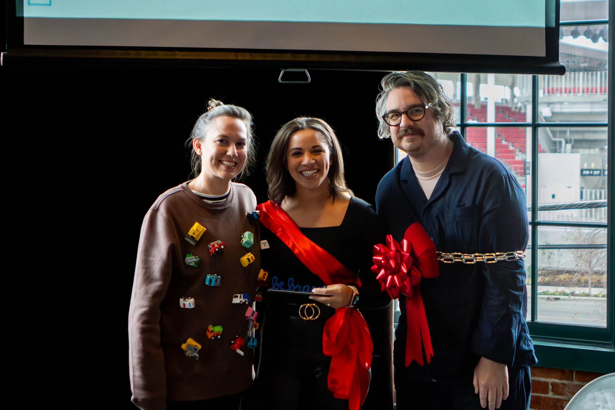 The three finalists for the "Be Brave" award. From left to right: Dani Gratton - ACD - Art, Rachel Weis - Account Director and Ryan Doggendorf - Creative Director.